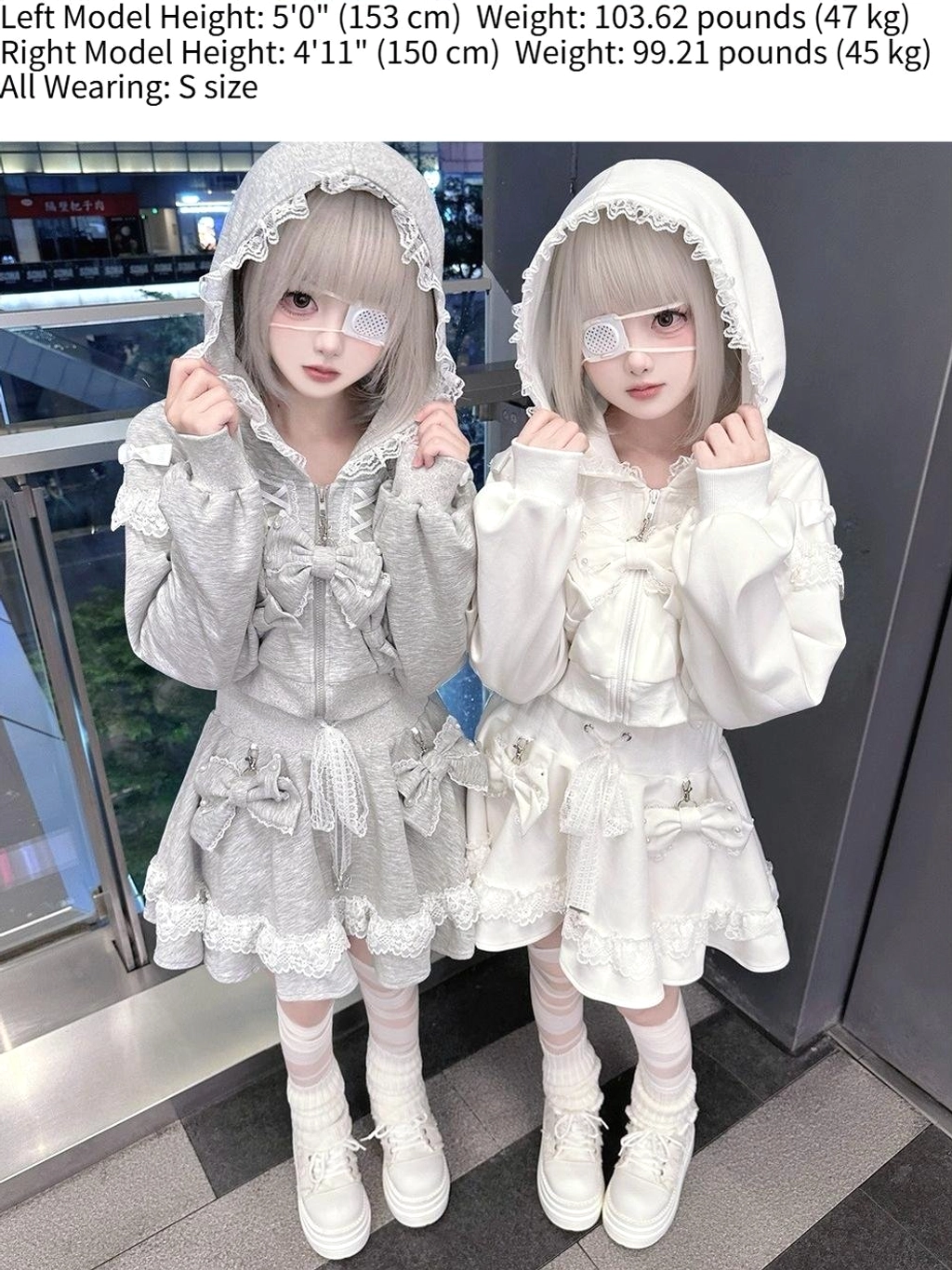 Twin models with hooded zip-up lace ryousangata hoodies, decorative eyepatches, mall balcony scene jirai kei styling