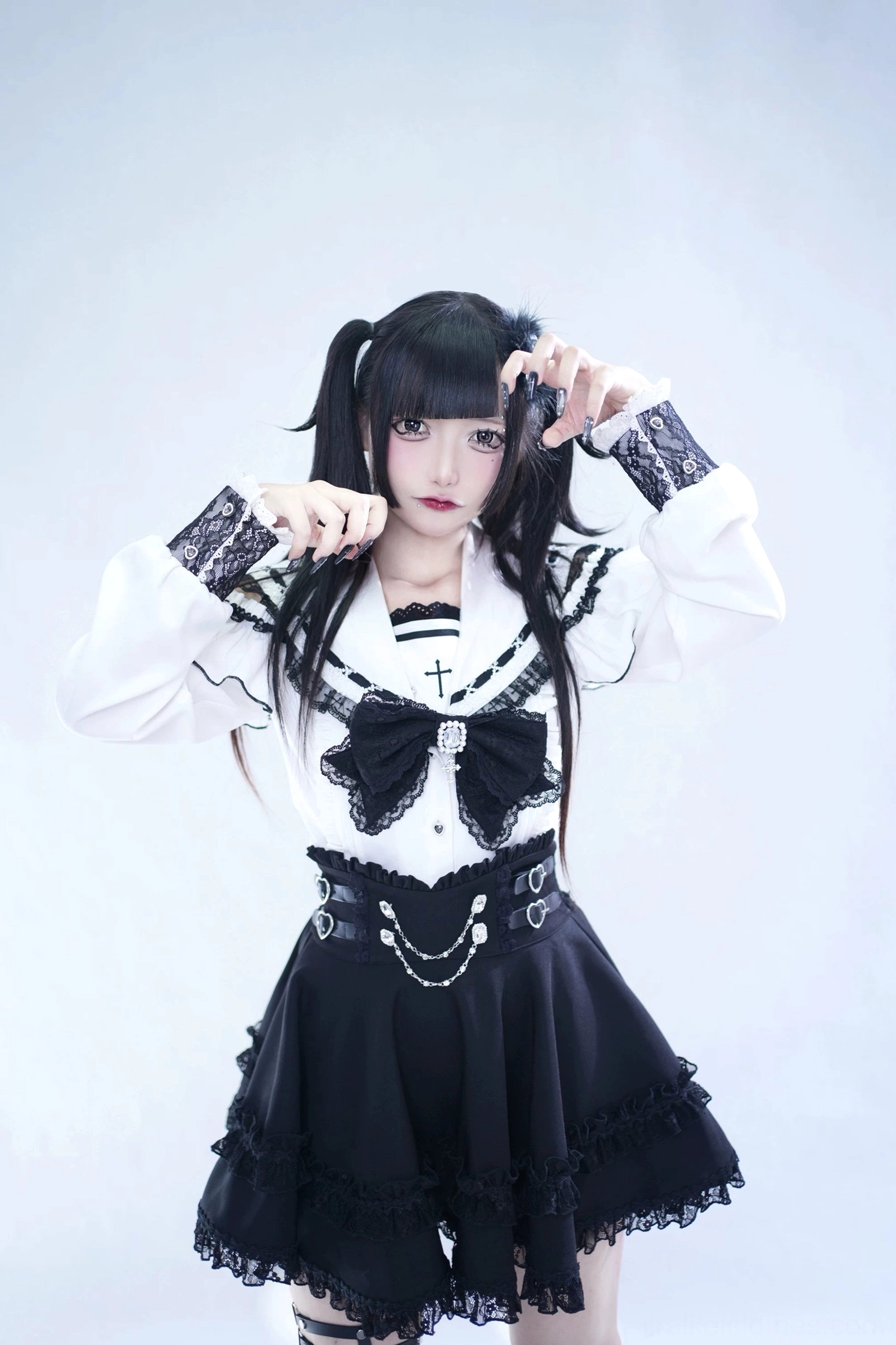 Front close-up view of sailor collar Jirai Kei blouse featuring cross pattern on collar and heart-shaped chain waist buckle