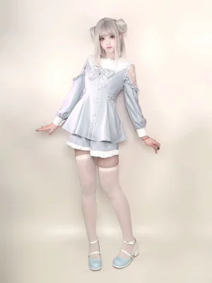 Light blue sailor collar Jirai Kei dress set with long lace sleeves and detachable bow front view on model in studio