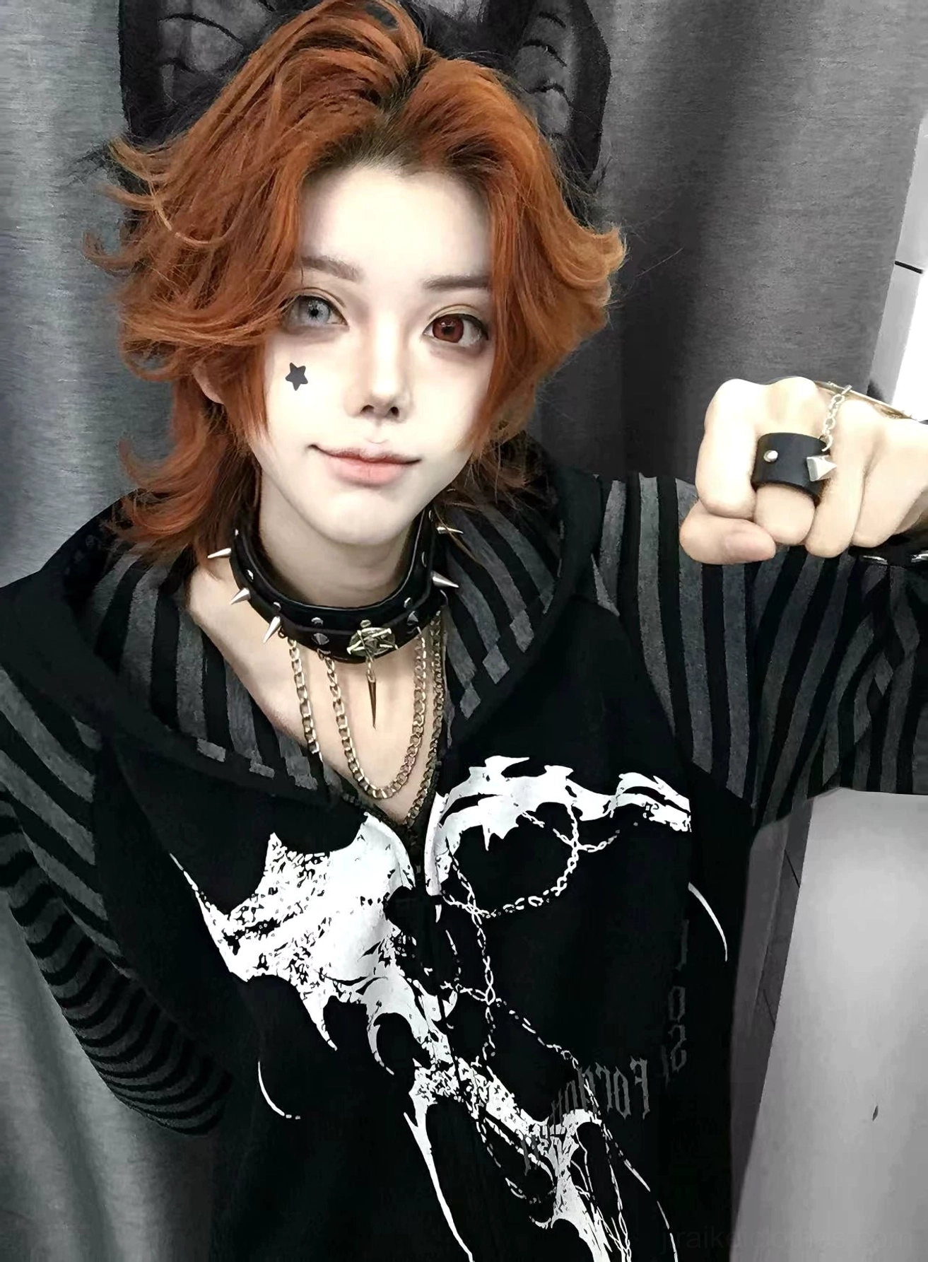 Red-haired model close-up front view of hooded scythe print zip coat showing detailed scythe graphic print design Jirai Kei dark aesthetic