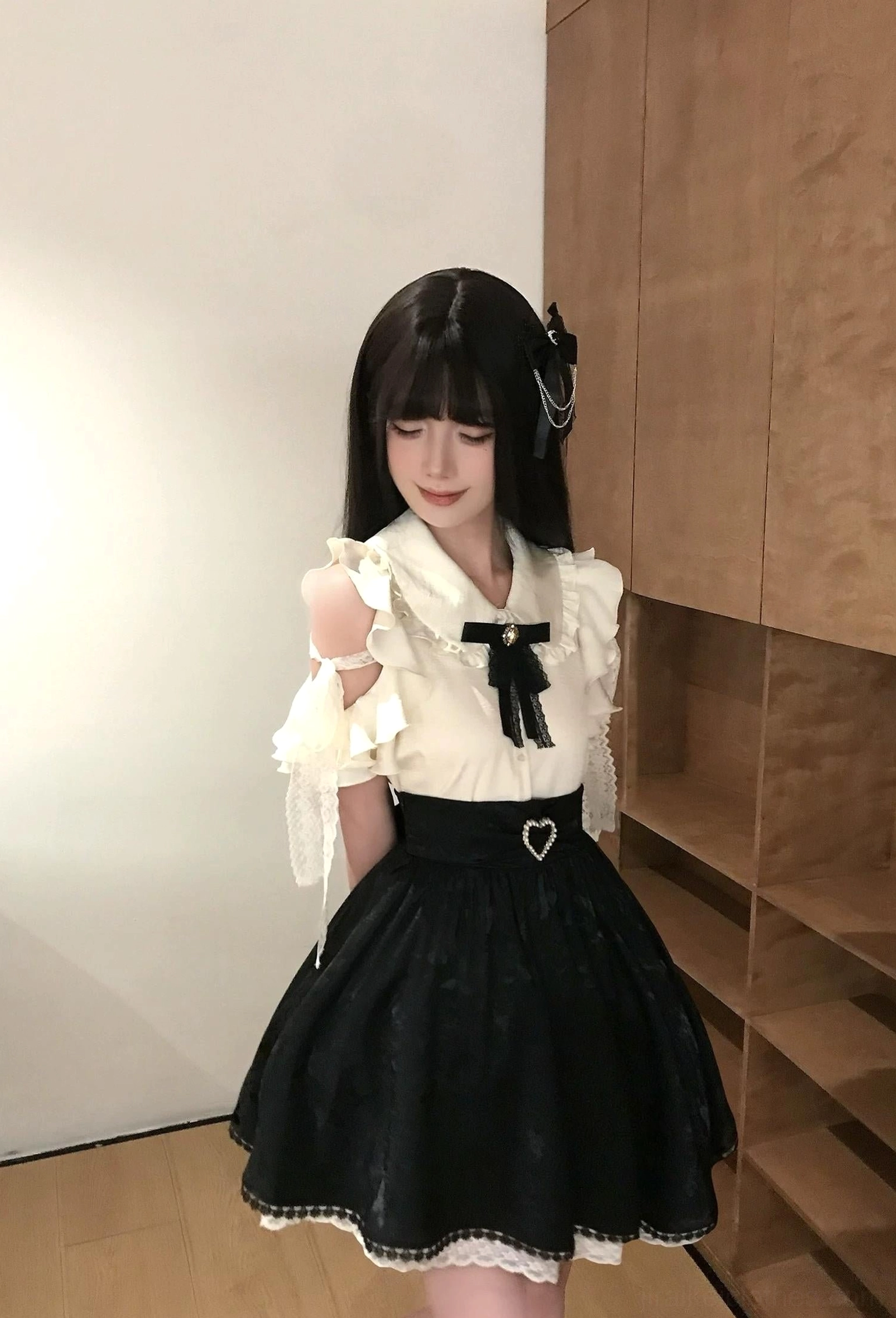 Back view of Seiso Kei butterfly jacquard skirt with heart-shaped waist accent and white lace trim hem detail