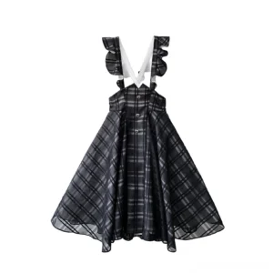 High-waist plaid suspender midi skirt with adjustable braces and A-line silhouette, flat lay product photography on white background showing detail of ruffled shoulder straps and front button design