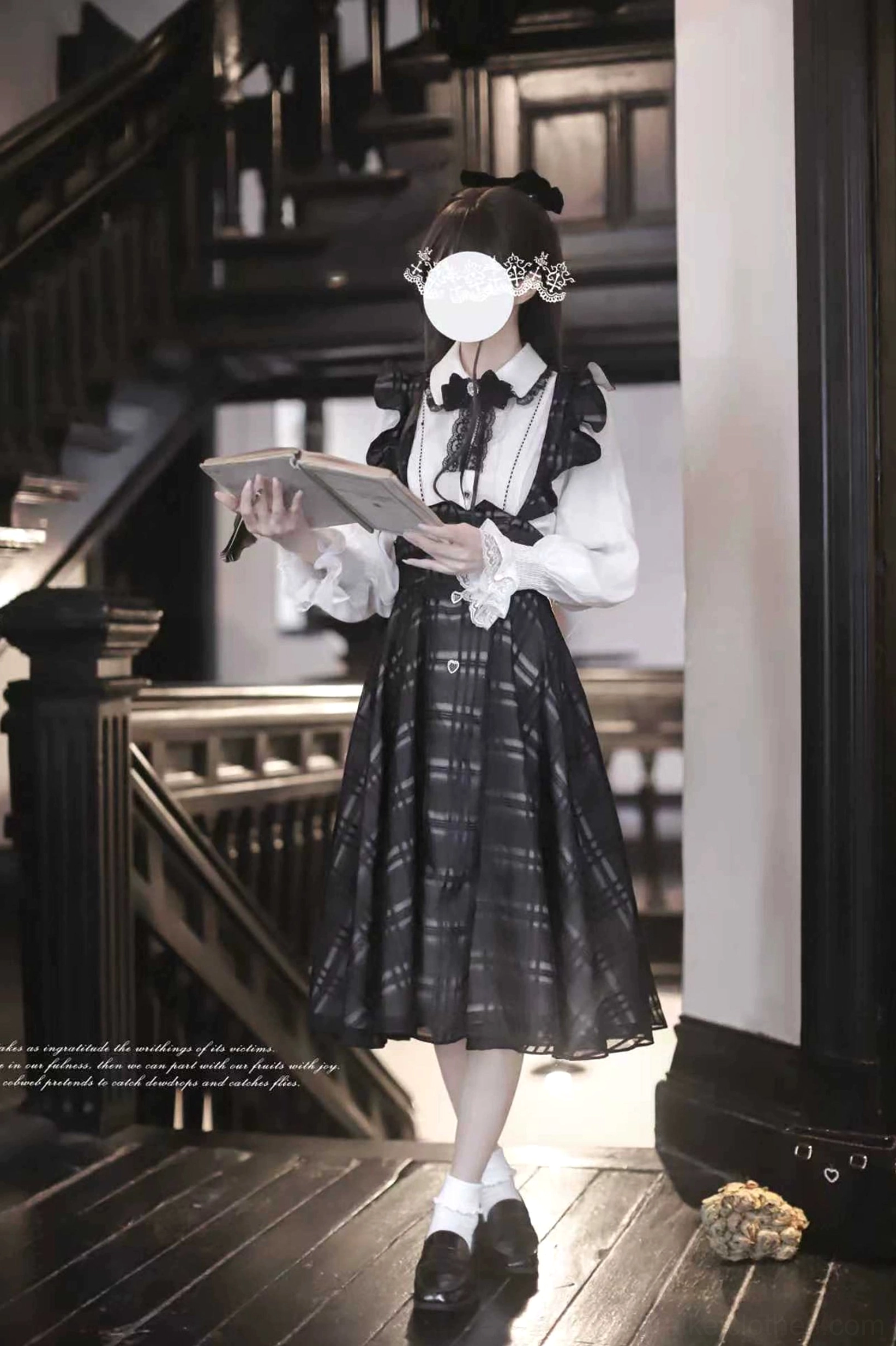 Seiso Kei two-piece coordinate side-front view featuring white lace-trimmed blouse, dark plaid suspender skirt, and hair accessories in vintage staircase indoor venue