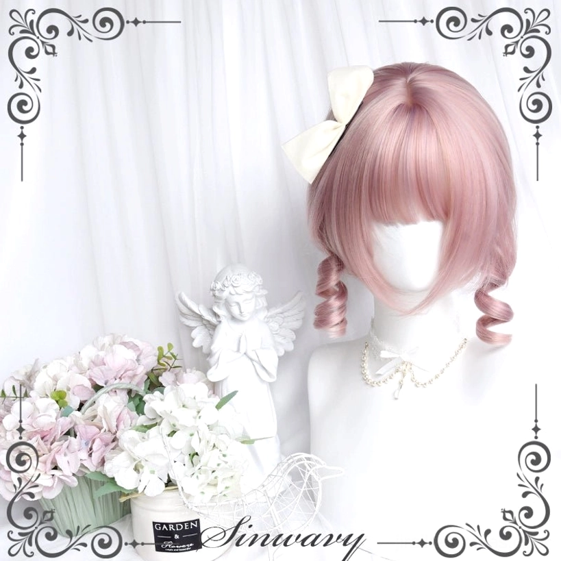 Short pink Lolita bangs wig display on mannequin with cream-colored top bow and delicate side ringlet curls against European flower and angel decoration background
