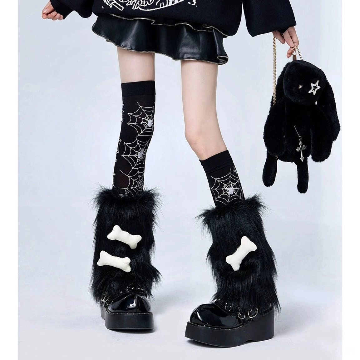 Spider web print black thigh-high socks with black plush leg warmers white bone accents punk leather skirt studio outfit Jirai Kei