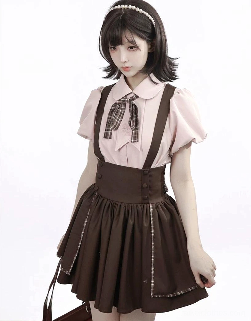Suspender skirt elastic waist and adjustable straps close-up showing high-waist design comfort features jirai kei construction details