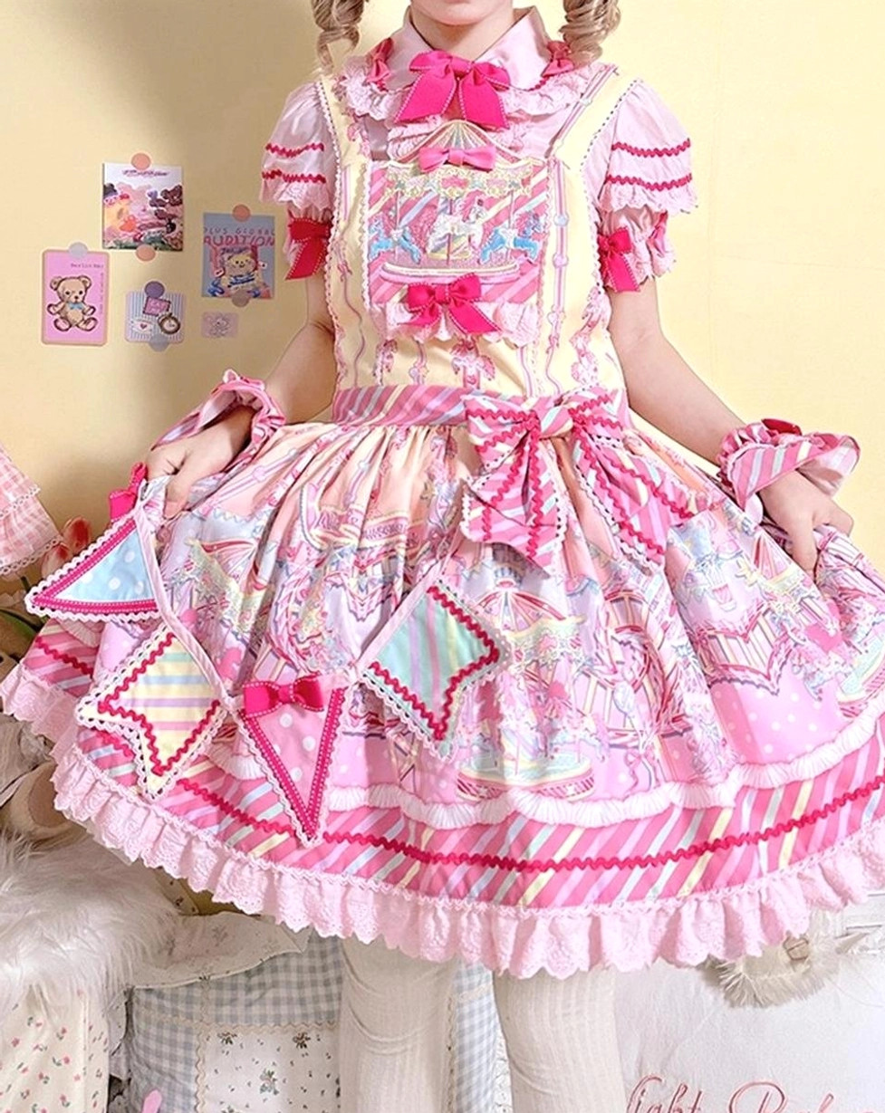 Close-up detail view of sweet Lolita JSK showcasing detailed cartoon prints large waist bow and diamond fabric patches ruffled hem