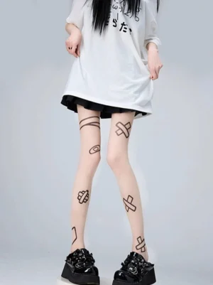 Ultra-sheer nude tights with black injury-themed tattoo prints front partial full view y2k subculture aesthetic matching outfit