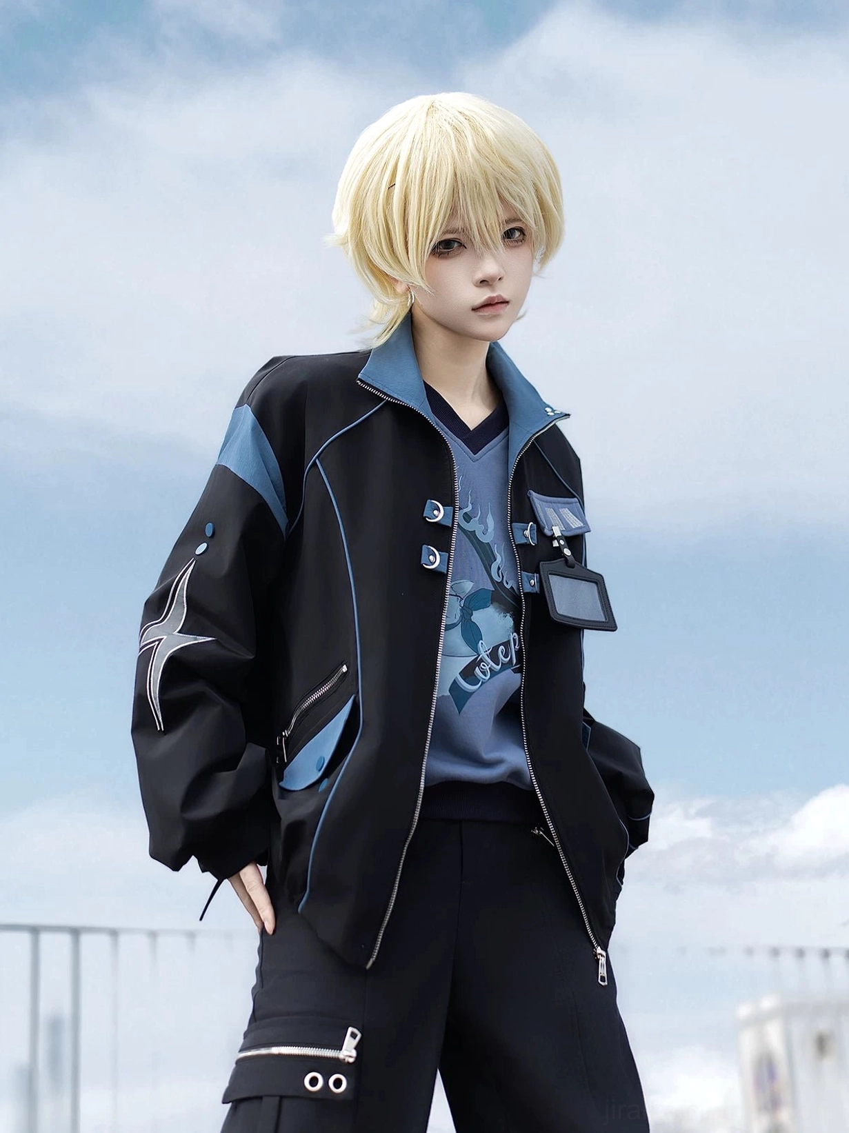 Drawstring hem and elastic back waist details of Techwear Cargo Pants in black with blue accents for adjustable fit