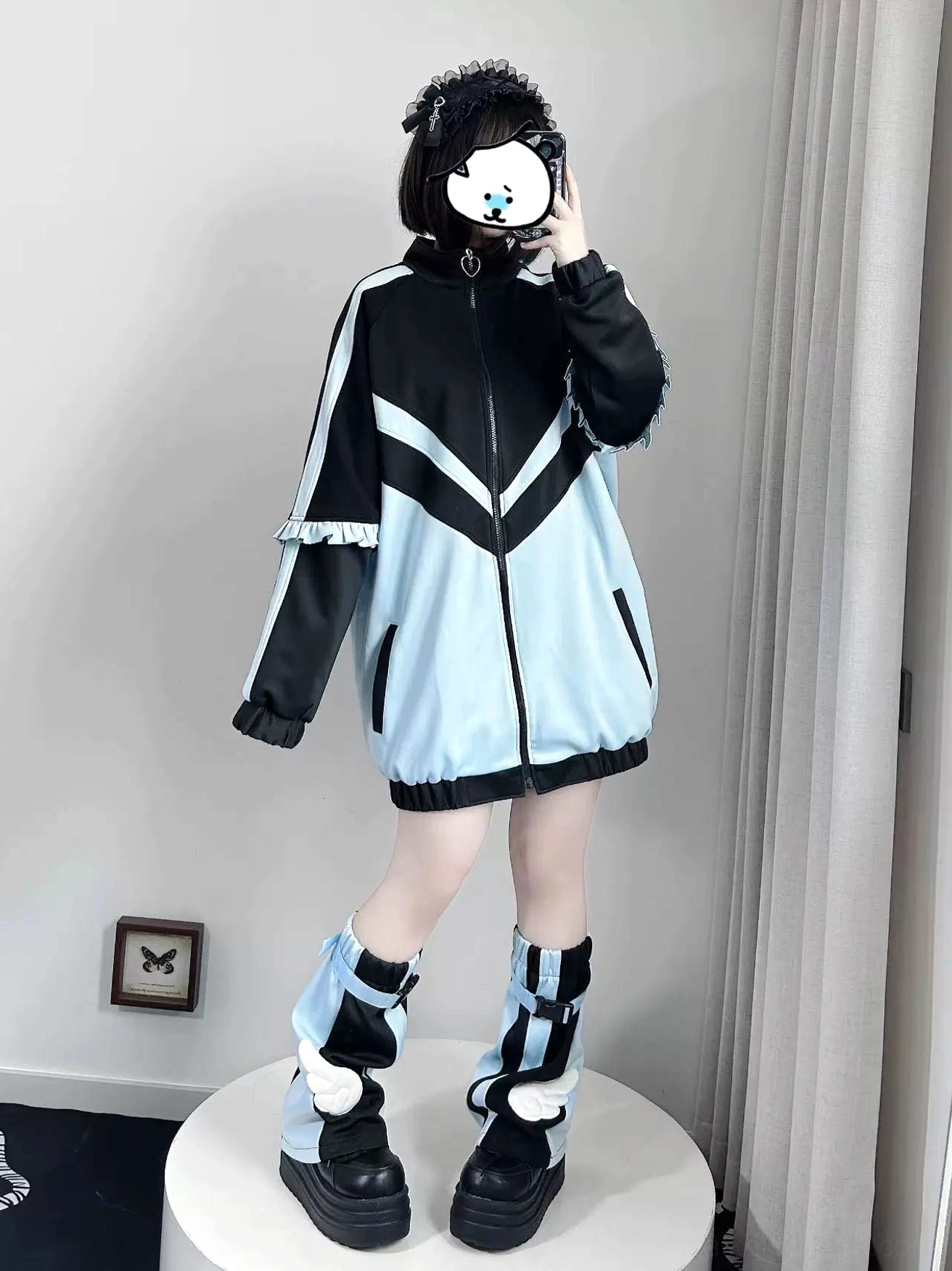 Tenshi Kaiwai oversized color block jacket set in black and light blue with matching leg warmers, loose fit mirror front selfie view showing proportions