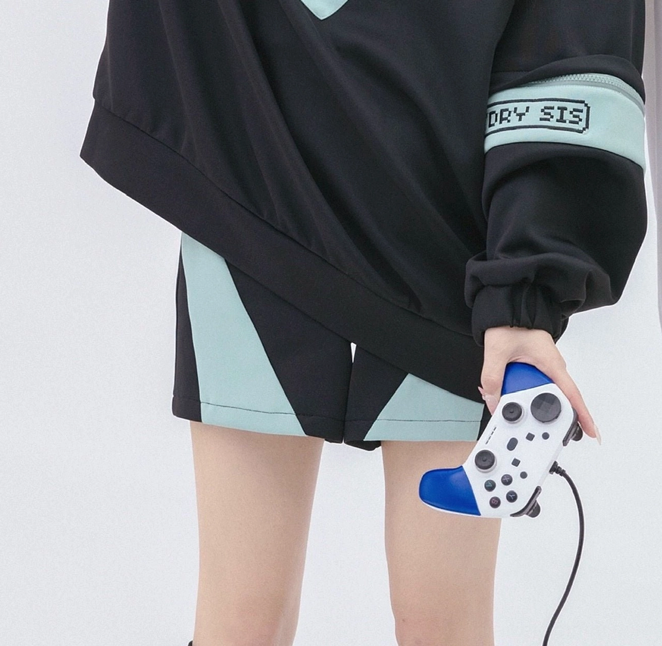 Black and green Tenshi Kaiwai shorts only option with elastic waist, coordinating color-blocked design, and gaming fashion aesthetic