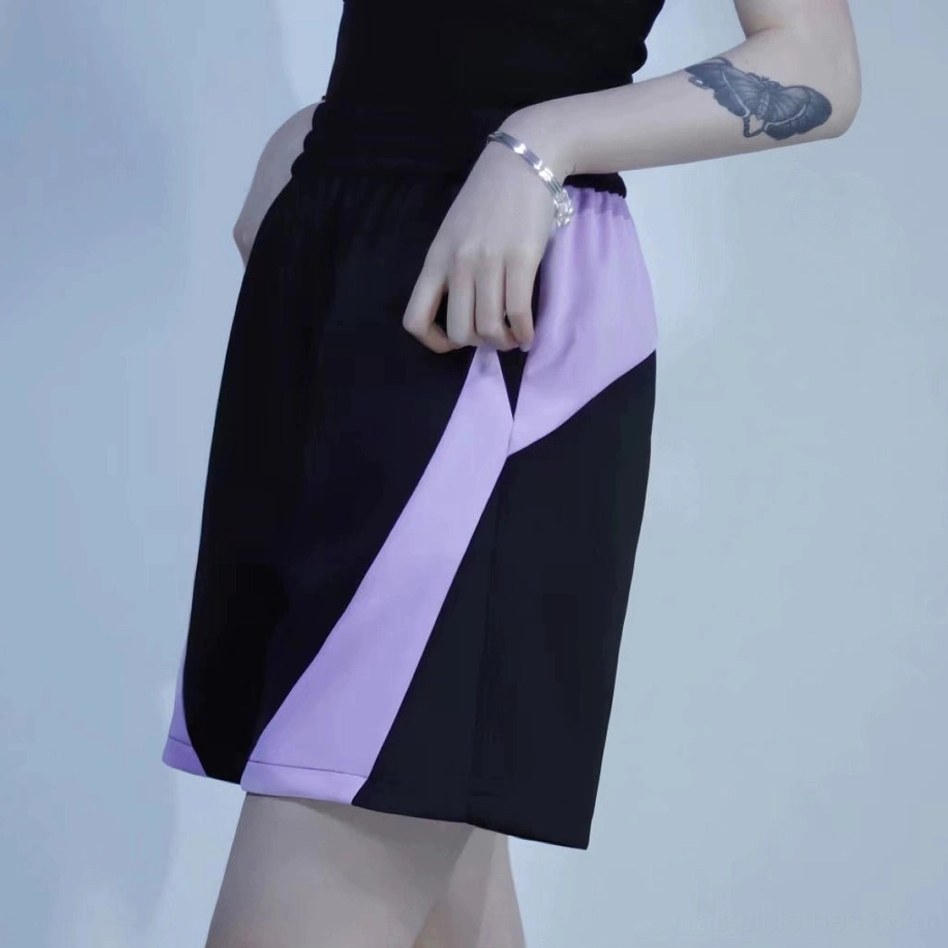 Black and Purple Tenshi Kaiwai Jirai Kei shorts with elastic waistband color-block design standalone component product photography
