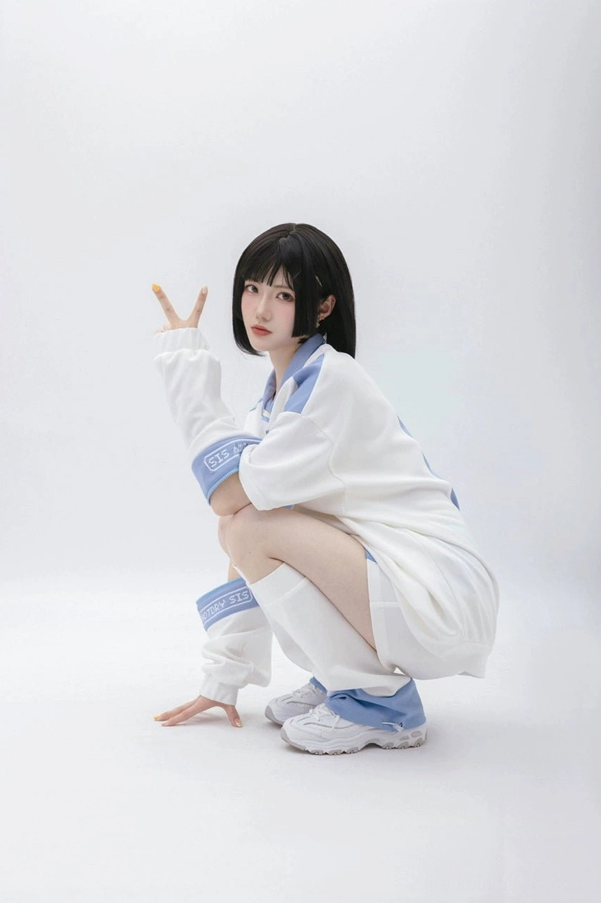 Complete blue and white Tenshi Kaiwai full set including sweatshirt, shorts, and leg warmers with celestial star motifs and color-blocked design
