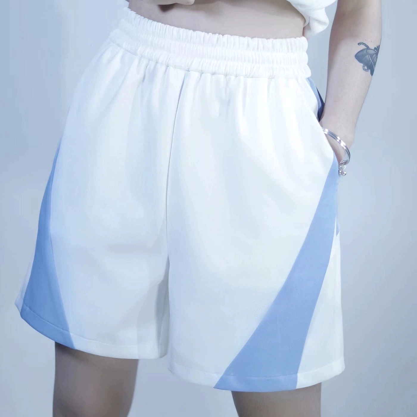 Blue and White Tenshi Kaiwai Jirai Kei full length pants with elastic waistband and oversized fit standalone piece styled product photography