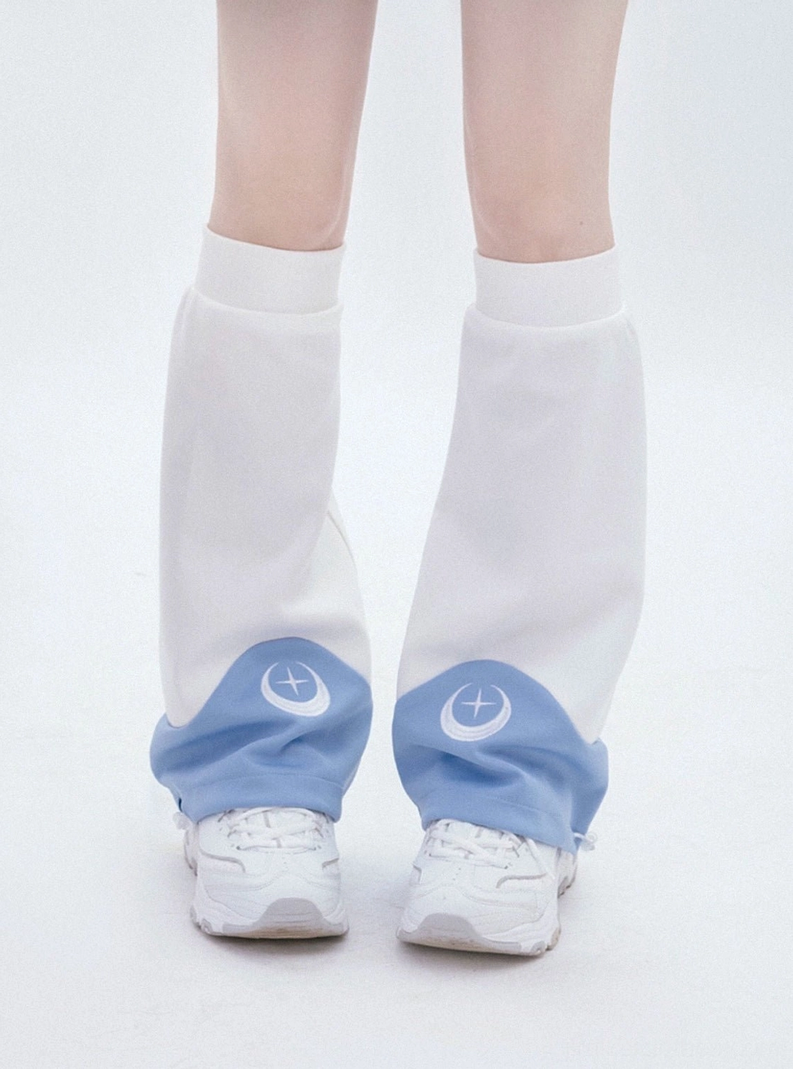 Blue and white Tenshi Kaiwai leg warmers only with celestial crescent star pattern at hem and free size elastic calf circumference