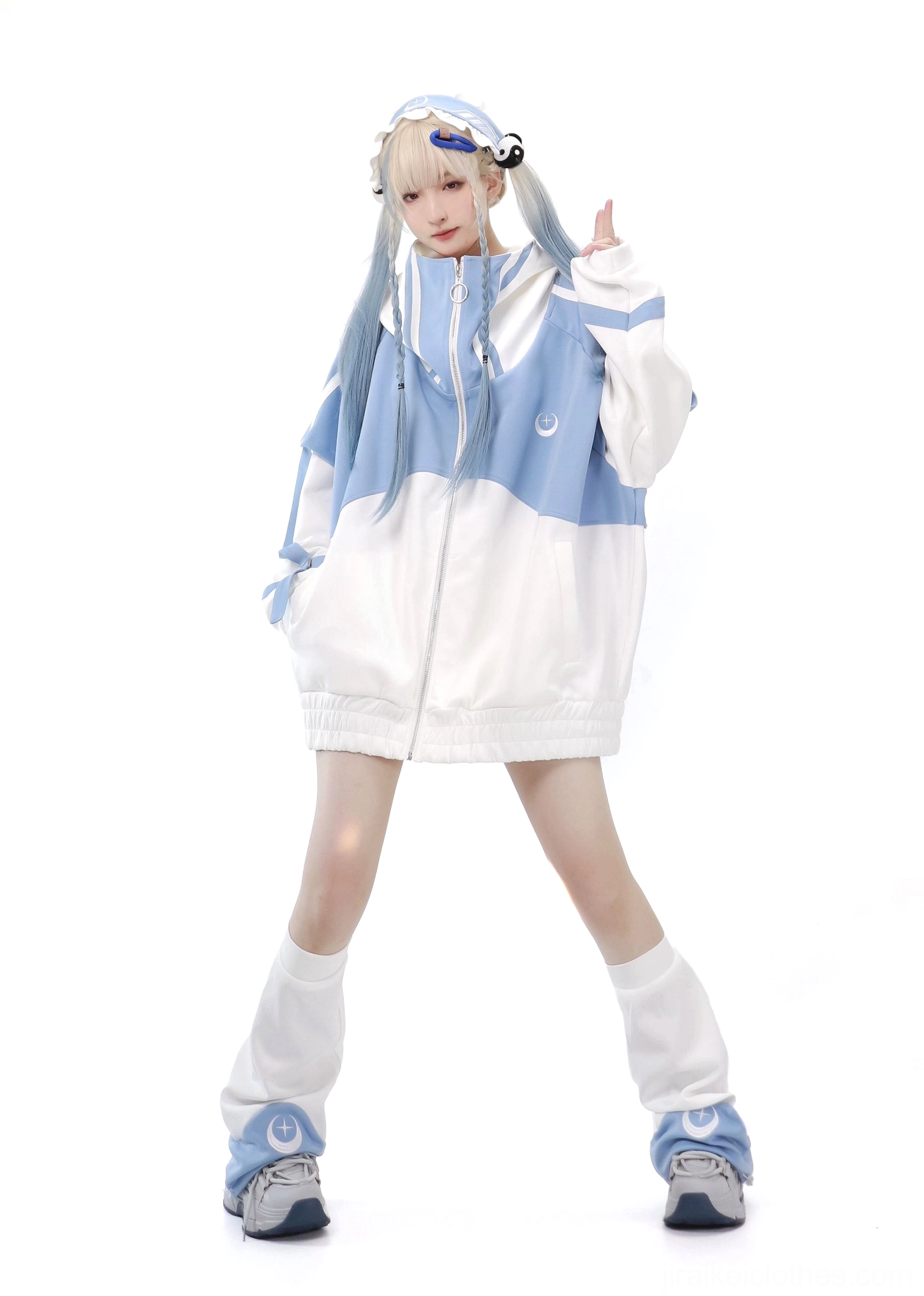 Blue-white Tenshi Kaiwai oversized loose sports jacket worn as mini dress with color-blocked panels and zip collar detail on blonde model full-body front view white studio