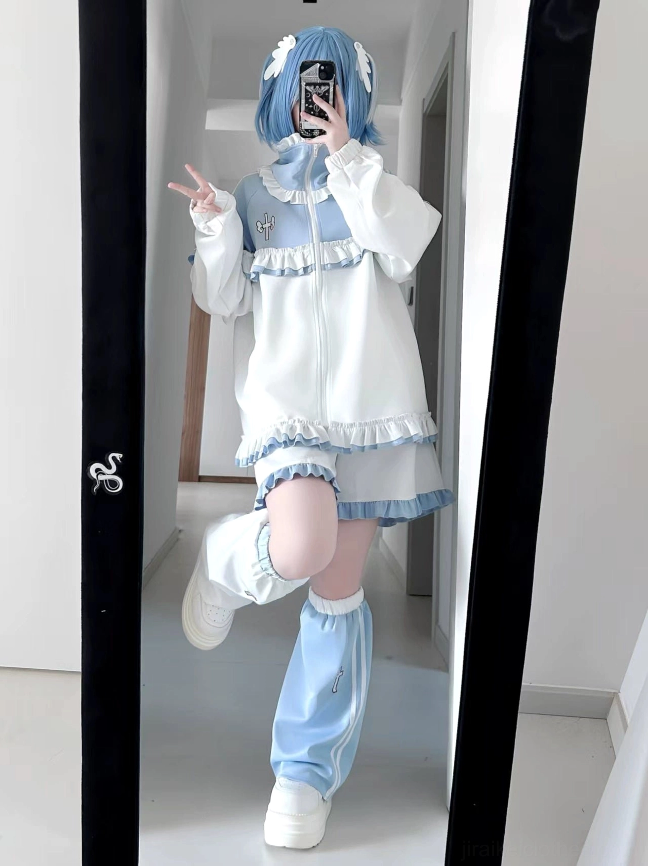 Blue-white ruffle Tenshi Kaiwai Jirai Kei tracksuit with color-blocking, frill trim jacket, short skirt and striped leg warmers styled in mirror selfie