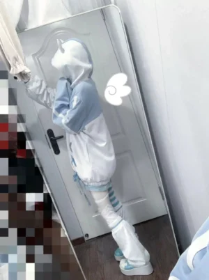 Blue white cat-ear hoodie side back angle mirror selfie with partial lace-up design and striped thigh-highs indoor room view