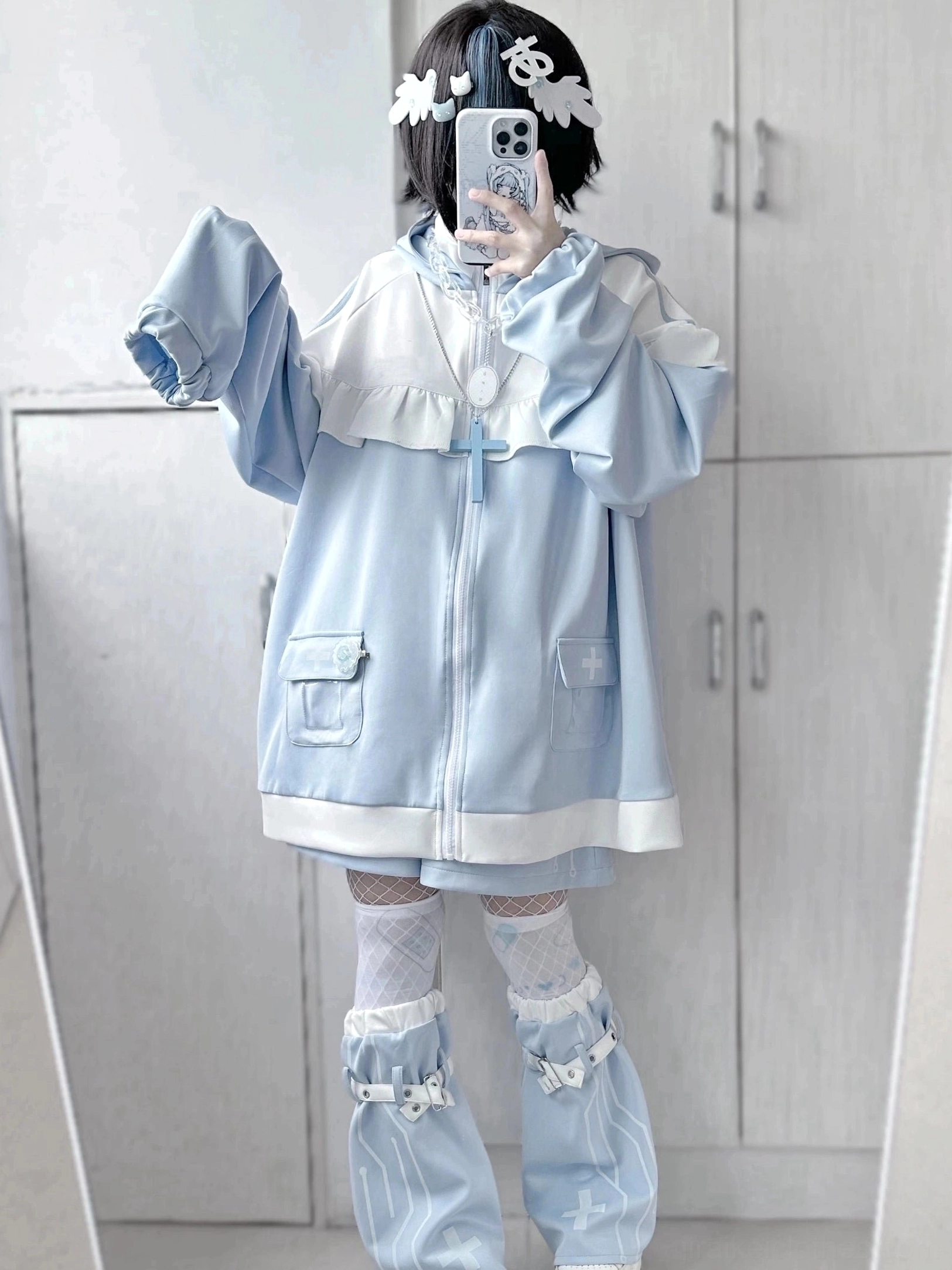 Tenshi Kaiwai cat ear jacket front zipper closure and front pockets detail shot showing functional design elements close up