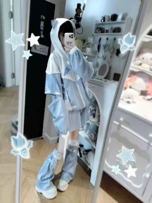 Side profile view of Jirai Kei hooded jacket with long detachable sleeves, elastic waist shorts, and coordinating leg warmers worn with platform casual shoes, demonstrating loose silhouette and movement