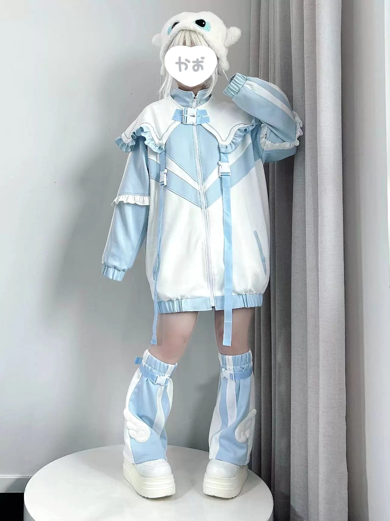 Oversized color block Tenshi Kaiwai jacket with high collar and leg warmers set, side full-body profile view showcasing fit and design details