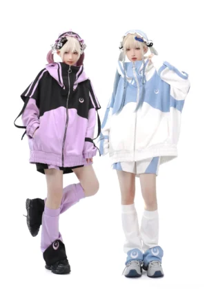 Tenshi Kaiwai color-block loose sports set full-body front view featuring two blonde models wearing purple-black and blue-white oversized hoodies with crescent moon leg warmers in pure white studio setting