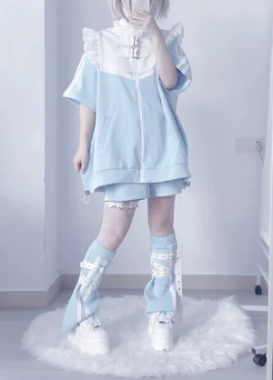 Tenshi Kaiwai detachable sleeve Y2K jacket with removable angel wings full-body front view model wearing light blue white oversized jacket fishnet stockings