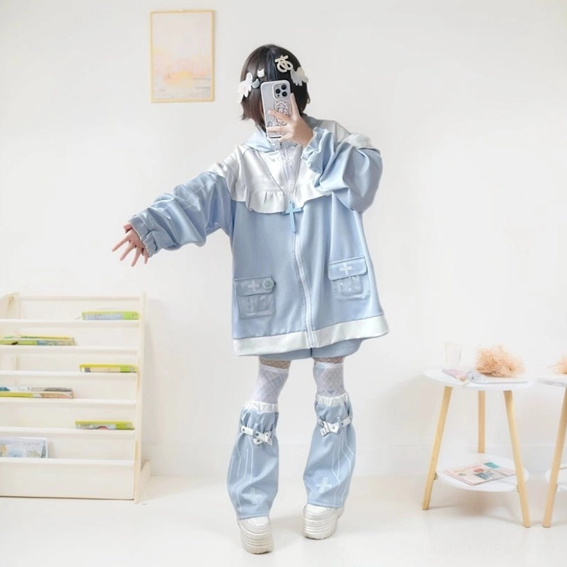 Tenshi Kaiwai jacket and shorts outfit with bow decorated leg warmers full body mirror selfie demonstrating front pocket and fit details