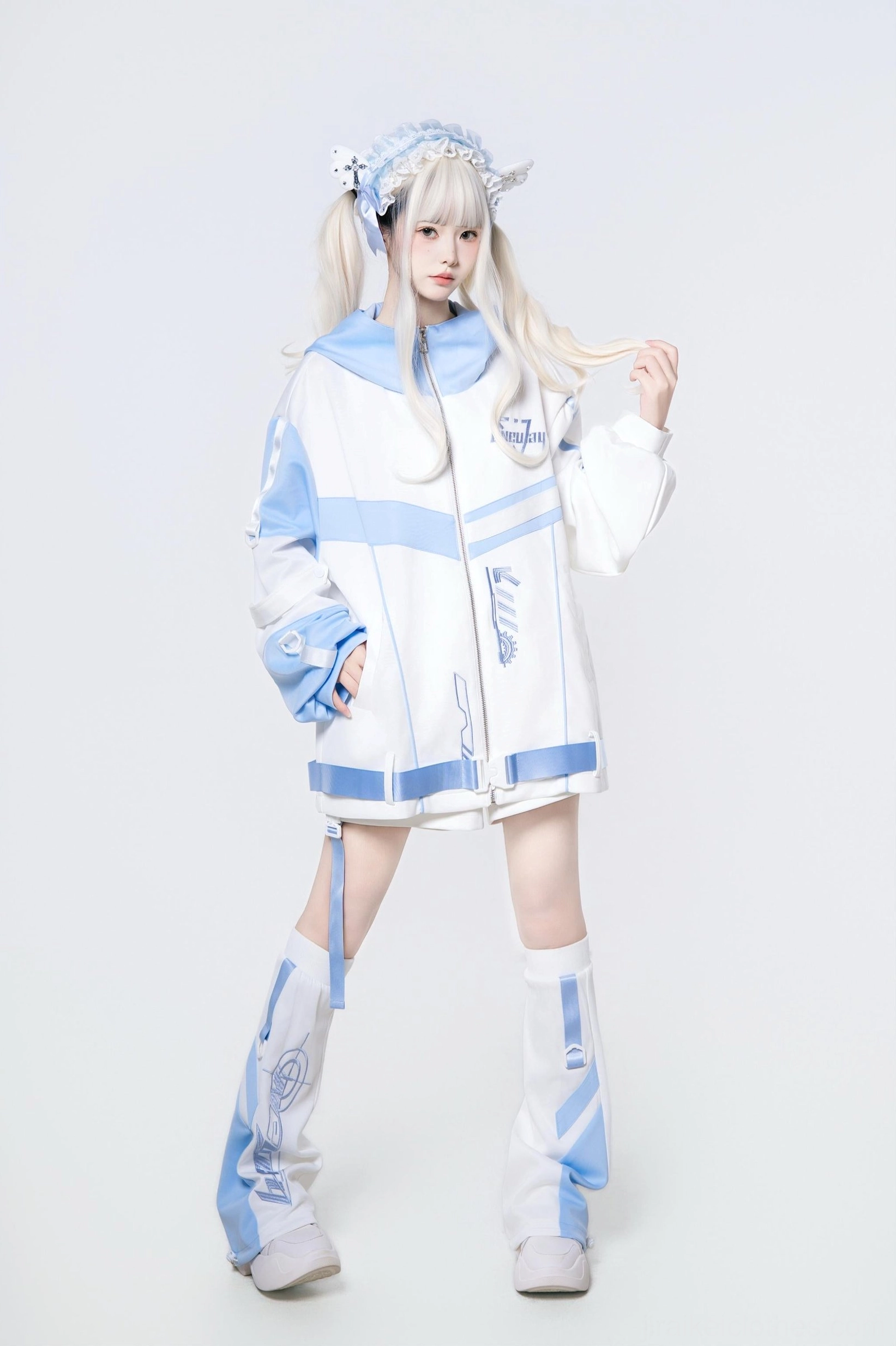 Tenshi Kaiwai oversized techwear hoodie set in blue and white colorway with matching shorts and leg warmers - full front standing view on model with twin tails
