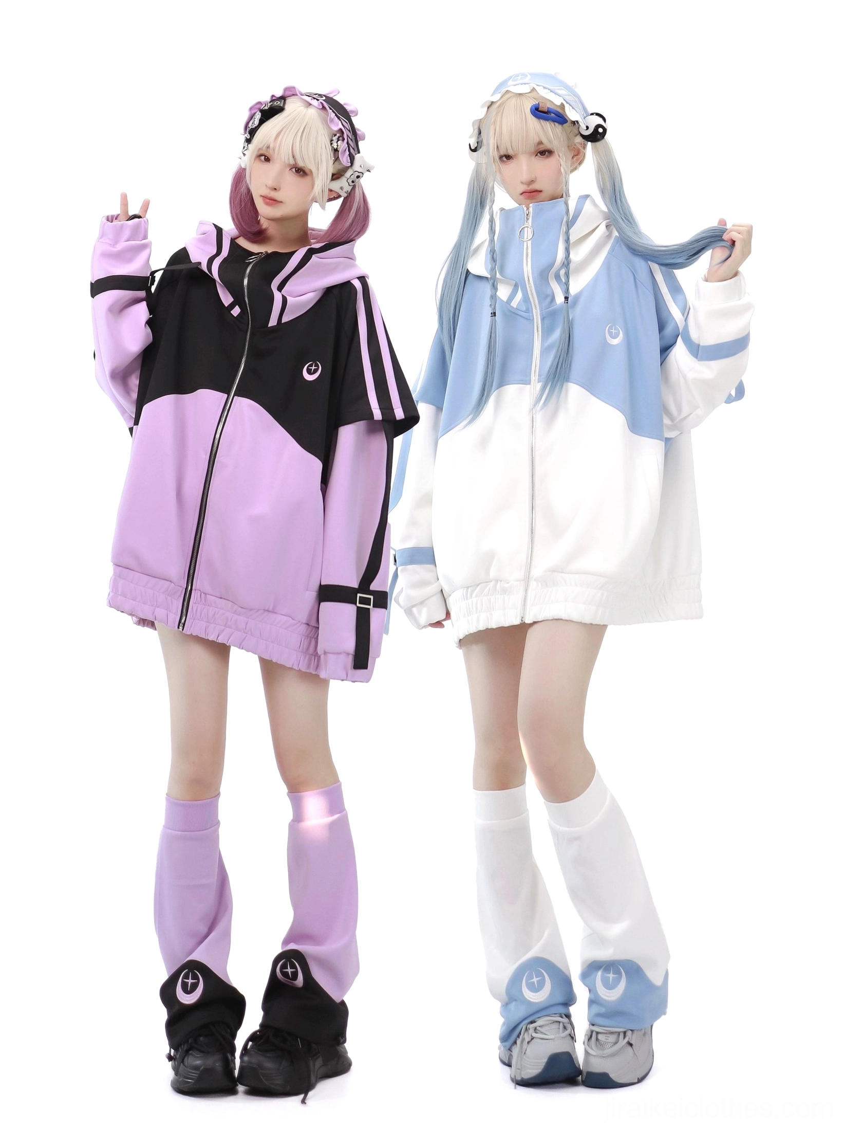 Purple-black Tenshi Kaiwai sports set with zip-up hooded jacket featuring crescent moon motif and striped sleeves on blonde model full-body front view in white studio