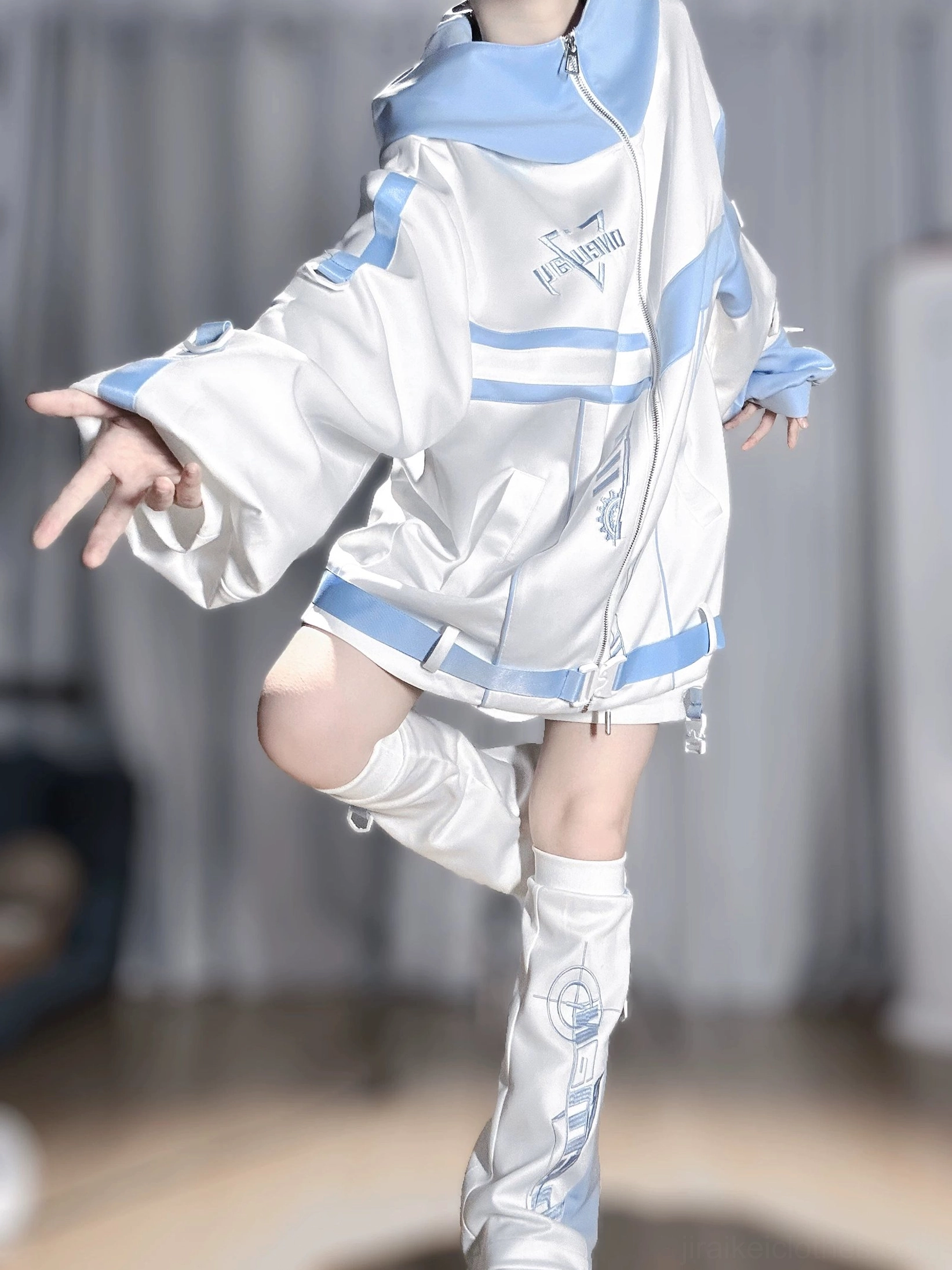 Tenshi kaiwai techwear hoodie right side pose with one leg raised, matching leg warmers, blue sleeve accents, and oversized jacket fit demonstration