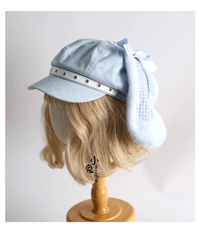 Baby blue Tenshi Kawaii bunny ear newsboy cap side three-quarter view blonde mannequin gingham lined rabbit ear fuzzy detail