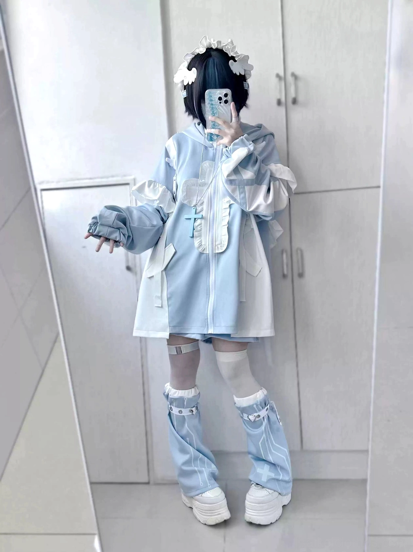 Full-length view of shorts piece laying flat showing overall silhouette and proportions for size reference