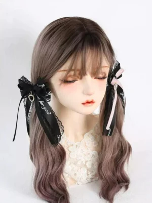 Twin black pink bow hair clips front view on mannequin with wavy brown hair Jirai Kei aesthetic with ribbon accents and metal charms