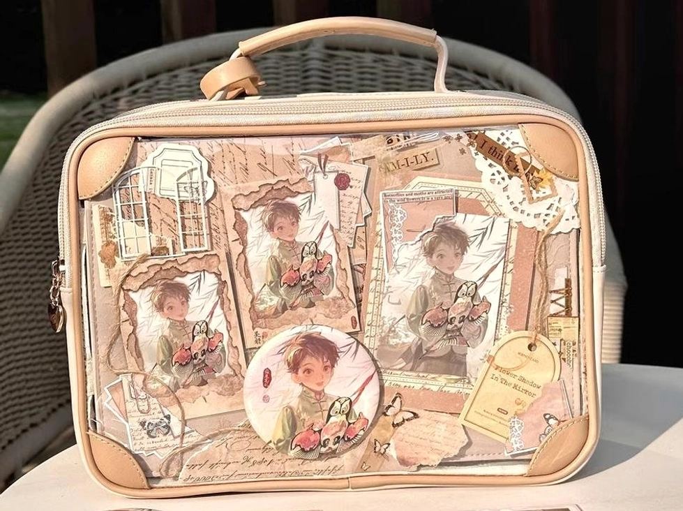 Vintage themed itabag front flat lay tabletop detailed vintage anime character collage print matching leather trim edges display window