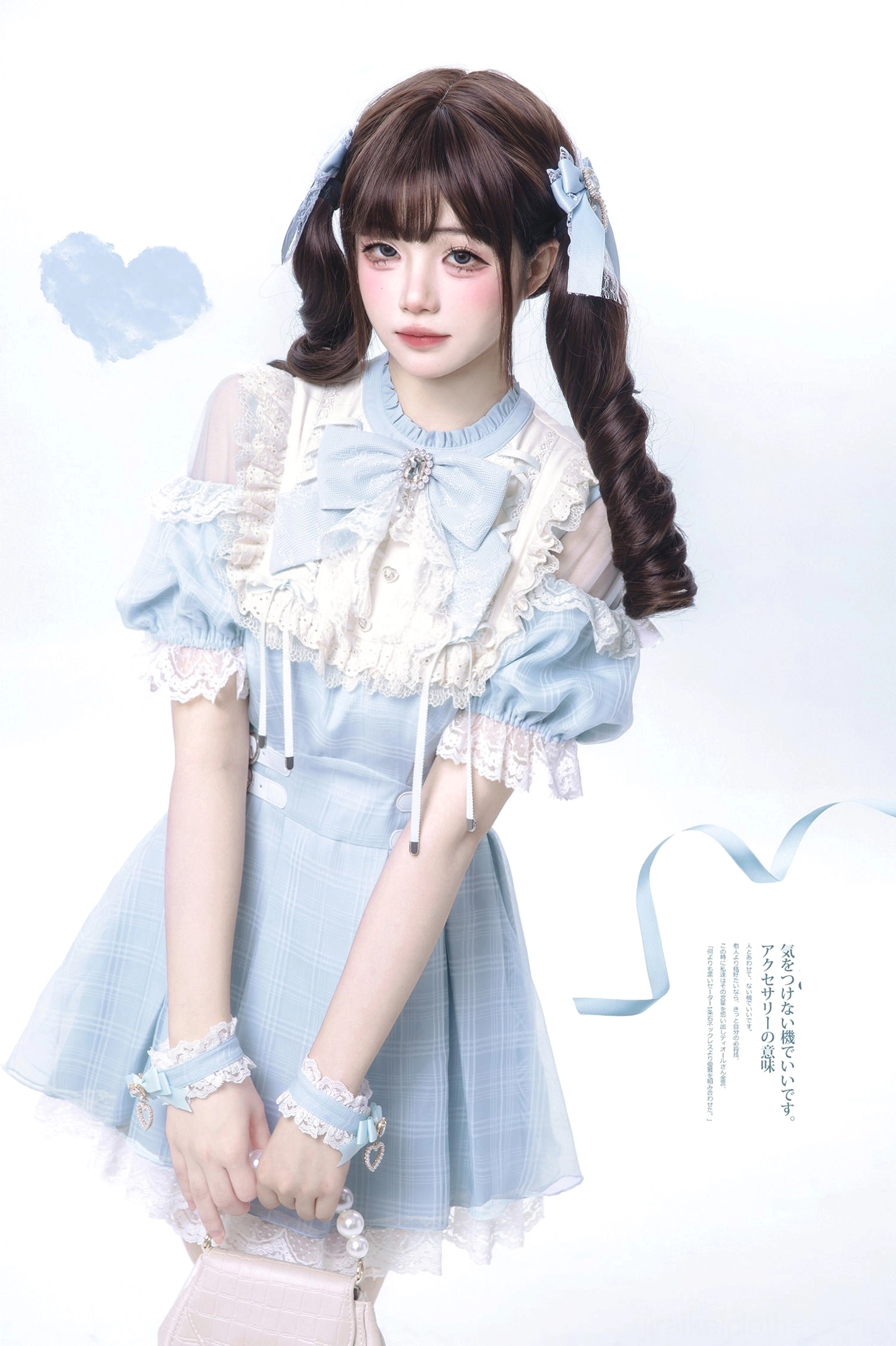 Water blue Jirai Kei dress front close-up shot of white lace wrist cuffs double bow details sheer sleeve panels and refined feminine accessories