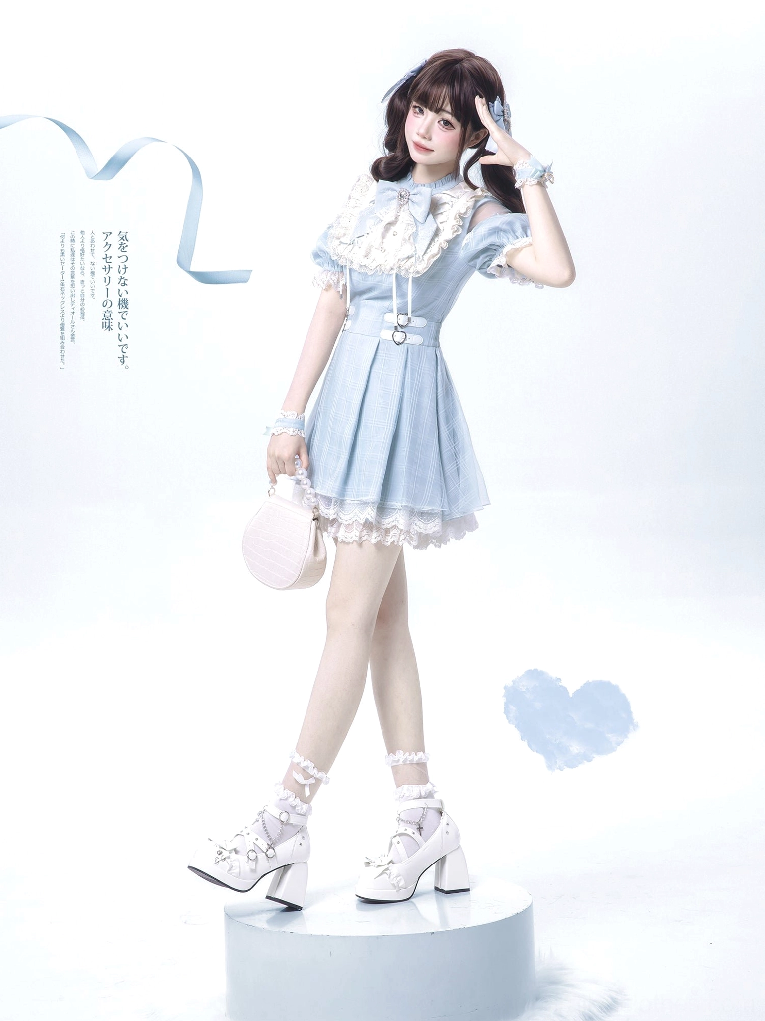 Water blue Jirai Kei dress side full body shot on round display platform with white high heeled platform shoes and hand pose detail