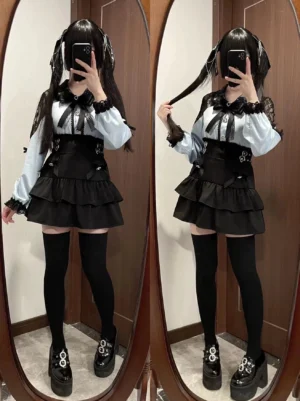 Water blue Jirai Kei blouse and black tiered skirt set worn with twin-tails hairstyle and black thigh-high stockings platform shoes