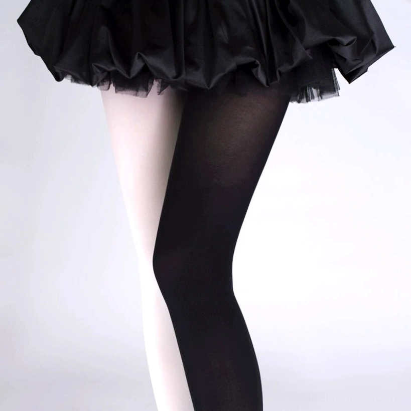 Back leg view of white and black split velvet jirai kei pantyhose with black ruffle satin skirt