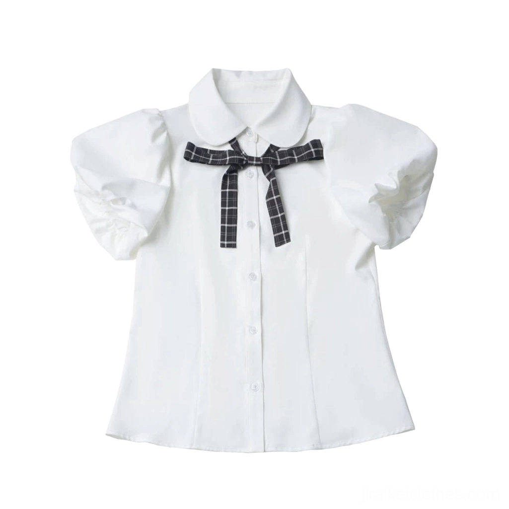 White puff sleeve bubble blouse flat lay featuring detachable black plaid bow tie Peter Pan collar front button closure jirai kei academia style