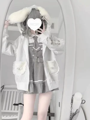white bunny ear jirai kei coat plush pockets mirror selfie front view girl with heart phone case