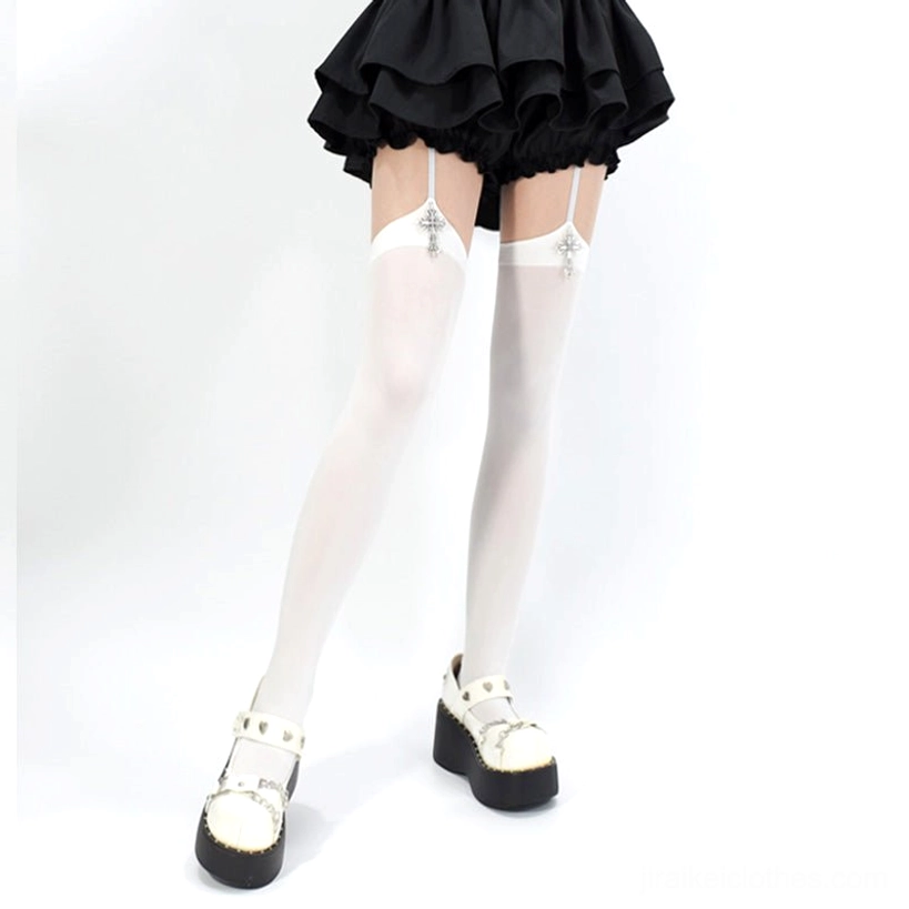 White cross pendant Jirai Kei garter thigh-high stockings front lower body view with silver cross charms and smooth velvet texture on model