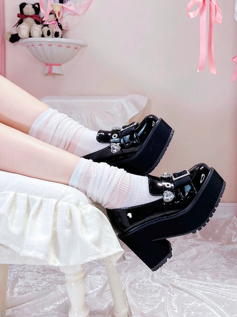 White glossy Jirai Kei platform loafers side view highlighting the substantial 4.5cm front platform and 10cm back heel design