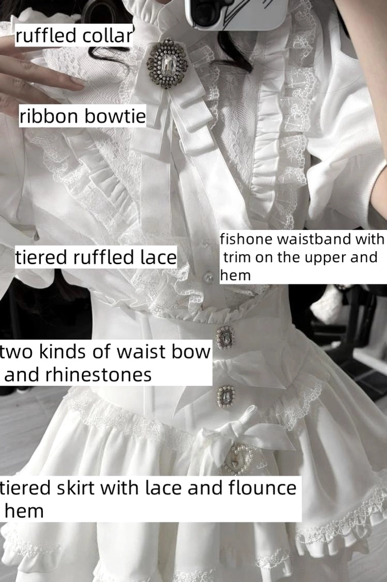 White gothic lolita outfit detail close-up showing ruffled collar, ribbon bowtie brooch, fishbone waistband, and tiered lace skirt construction elements