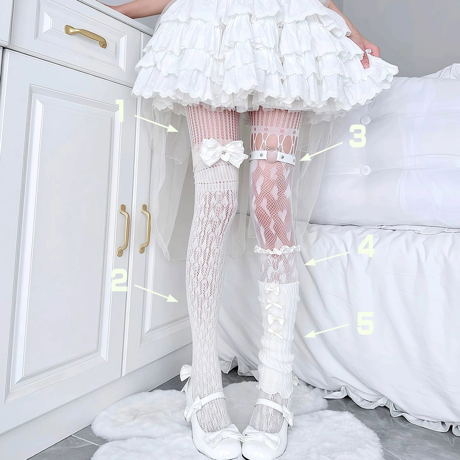 White heart-patterned fishnet Jirai Kei sock set with blue ribbon and bow accents, paired with white mary jane shoes and ruffled skirt