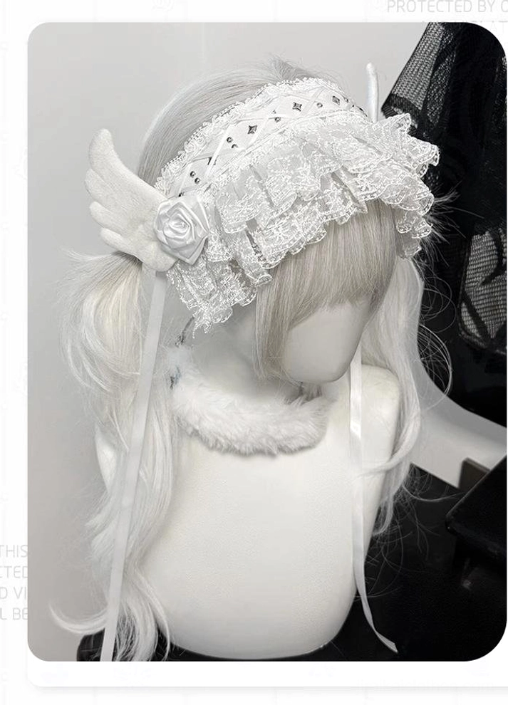 White studded Jirai Kei lace hairband close-up side view highlighting layered ruffle lace angel wing rose decor and extended long satin straps on half white hair mannequin