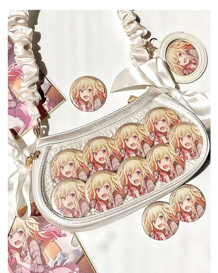 White Jirai Kei anime ita bag full product display from high side view showing ruched satin strap, large clear badge window with multiple anime badges, and complete aesthetic presentation