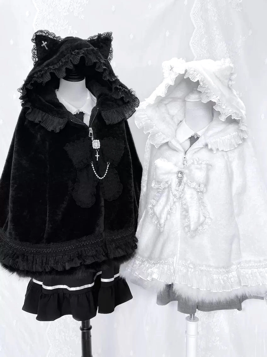 Ethereal angel-inspired styling of white jirai kei cat ear fleece cape hoodie showing light aesthetic and celestial themed arrangement
