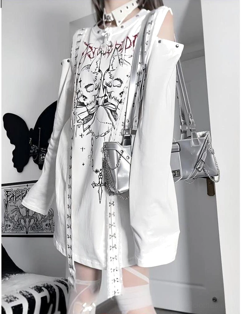 White cold-shoulder gothic oversized t-shirt with dual skull graphic right side 3/4 angle view