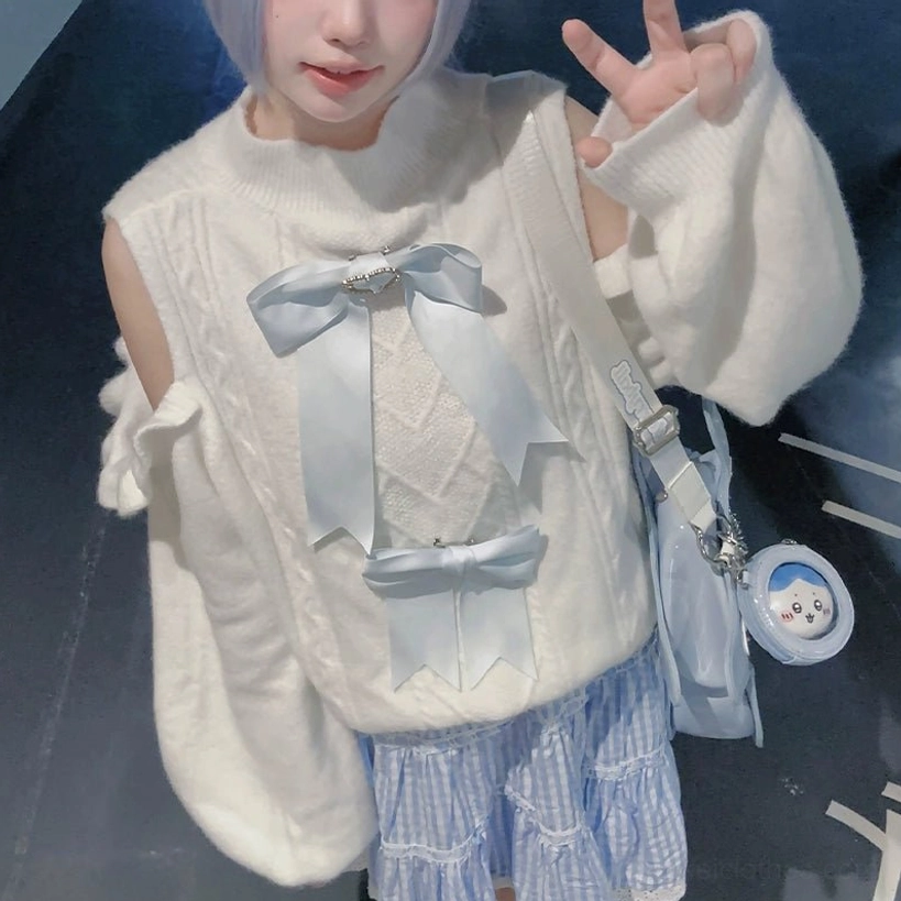 Full-body front standing view of white Jirai Kei sweater short version with two detachable chest bows and styling accessories